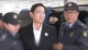 Samsung heir awaits fate in khaki jumpsuit