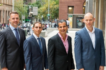 Simon Schwarz (2nd from left) with Greg Symons, co-founder; Jerry Yohananov, Chief Financial Officer; and Matt Symons, co-founder and CEO (l to r)