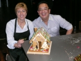 Infosys Senior Vice President and Country Head for Australia and New Zealand, Jackie Korhonen, with Peow Goh, formerly CIO of Rio Tinto, building gingerbread houses for disadvantaged members of the community in partnership with OzHarvest.