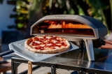 Give yourself a backyard digital detox with the Ooni pizza oven