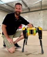 Dr Owen Carter with Chironix robot to be used by Australian Defence Force
