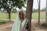 Radhika in India used a small loan from Opportunity International Australia to buy seeds and gardening equipment for farming, and to get money to send her children to school.