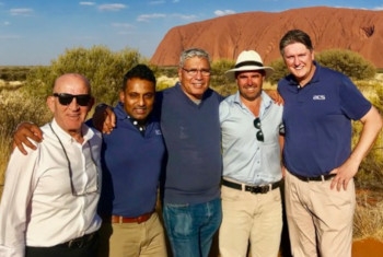 Representatives from ACS, Charles Darwin University and Chanston Paech at Uluru.
