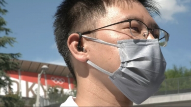 Alibaba intelligent ear-worn device helps reduce heatstroke risk for Tokyo Olmpics staff